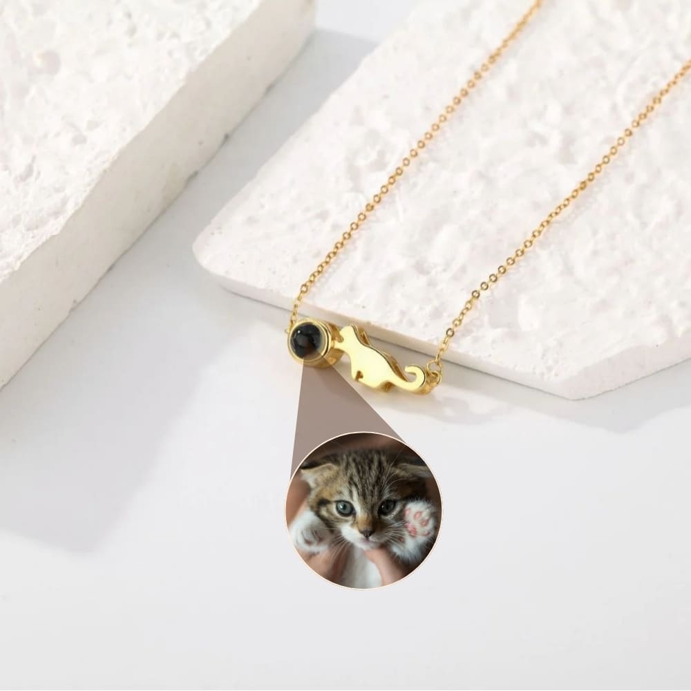 Cat Chasing Yarn Projection Pendant