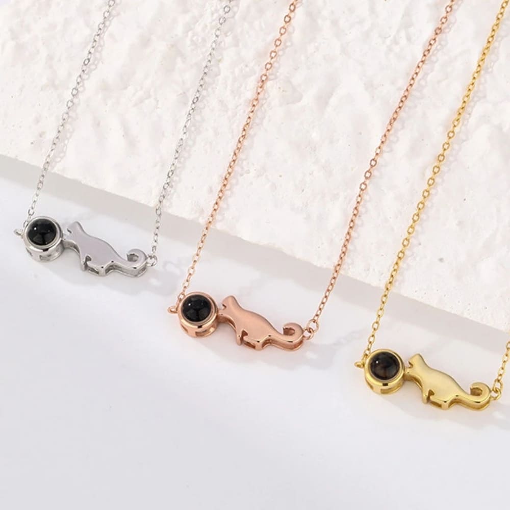 Cat Chasing Yarn Projection Pendant