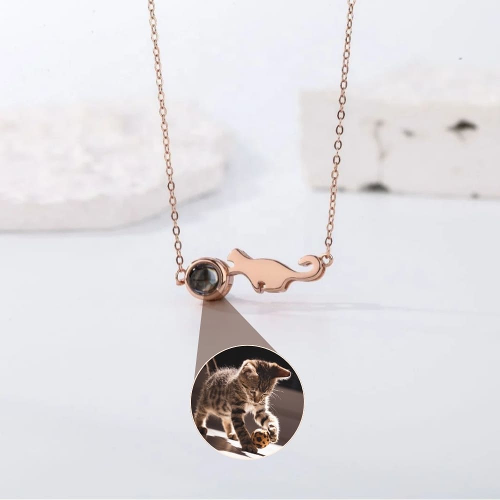 Cat Chasing Yarn Projection Pendant