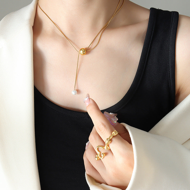 Orbit Pearl Drop Necklace