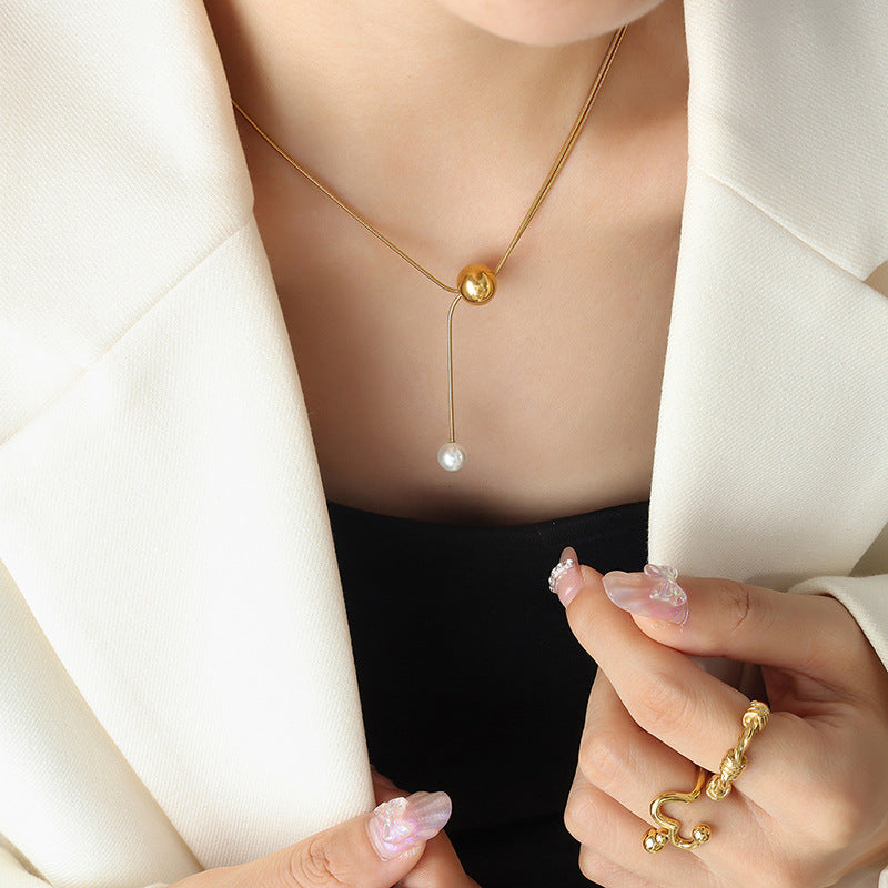 Orbit Pearl Drop Necklace